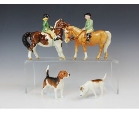 A Beswick figure of 'Girl On Pony', model no. 1499, designed by Arthur Gredington, in the piebald colourway, printed maker's 