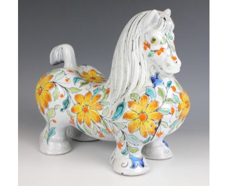 An Italian Mancioli 'Cavallo' earthenware model of a horse, 20th century, extensively decorated with stylised floral and foli