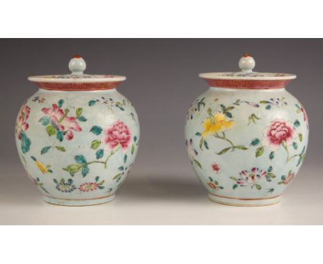 A pair of Chinese porcelain celadon-ground famille rose jars, Guangxu (1875-1908), each of ovoid form with flared rim and int