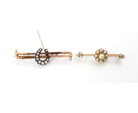 A Victorian style split pearl brooch, the raised central motif designed as a flowerhead with split pearls detail, with trefoi