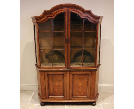 An 18th century Dutch walnut and floral marquetry side cabinet, profusely inlaid with chequered stringing and foliate detail,