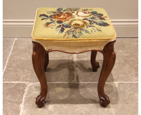 An upholstered mahogany dressing stool, early 20th century, the square tapestry seat upon French cabriole legs and scrolled t