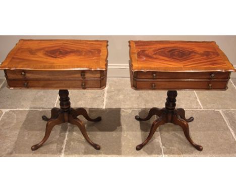 A pair of Georgian influence mahogany lamp/bedside tables, 20th century, each with a quarter veneered and cross banded shaped