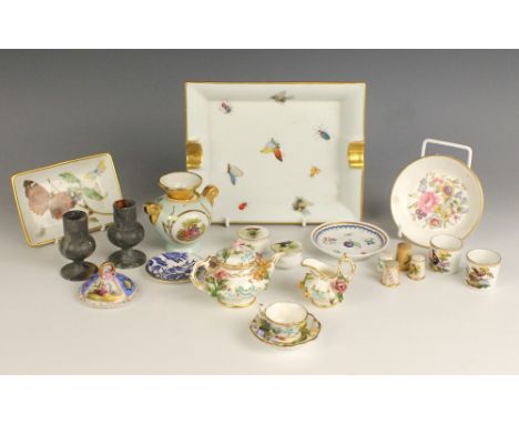 A Coalport Coalbrookdale miniature part tea service, early 19th century, comprising; a teapot and cover, a milk jug, and a te