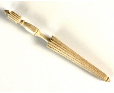 A novelty bone lace bobbin modelled as a ladies parasol, 19th century, 10.5cm long, with a selection of mother of pearl and b