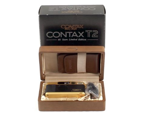 Gold Contax T2 Compact Camera. #UK0089 out of 500. In presentation box with case etc. (condition 3F).[cabinet I]