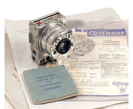 INCREASED ESTIMATE. Compass Camera By Le Coultre Co. #2719. (Condition 5F). With original instruction book, rare Compass Came