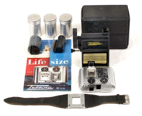 Tessina 35L Subminiature Camera. #565807. (condition 5F). With watch strap, extra cassettes in original containers and film l