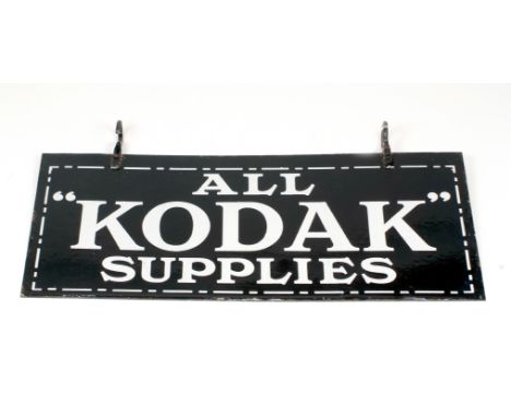 Large Double-Sided Hanging Enamel Kodak Sign. 28" x 12.5". In remarkably good condition, with just minor rust &amp; nibbles t