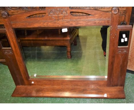 An oak Art Nouveau over mantel mirror 