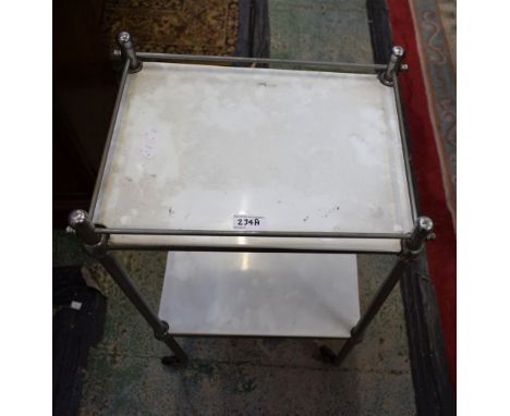 A 1950's dentrist's trolley, two ceramic tiers, chrome frame.