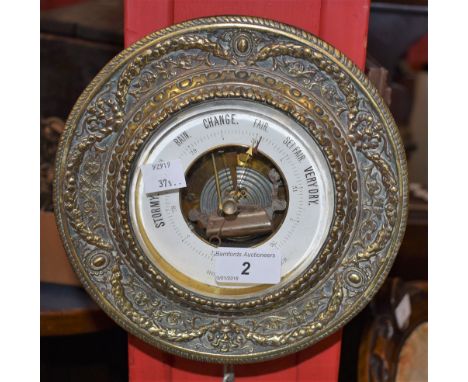 A 19th century gilt brass cased holosteric barometer