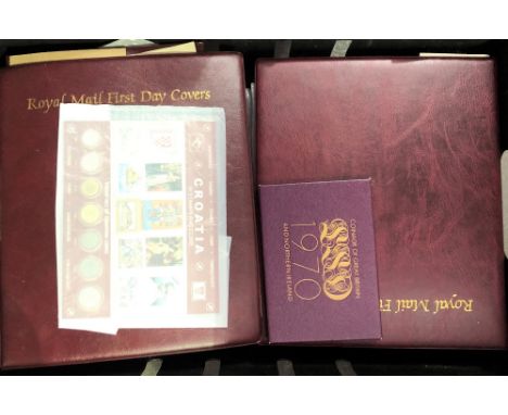 Four albums of Royal Mail First Day covers together with a 1970 Coinage of Great Britain decimal set