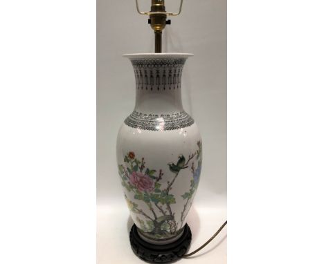 20th Century Chinese porcelain famille rose table lamp, foliate painted and with hard wood stand, height overall 53cm