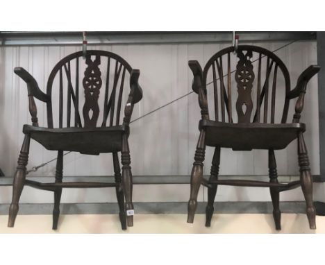 Pair of early 20th Century elm seat wheel, hoop and stick back elbow chairs