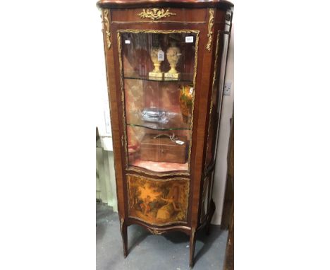 Louis XVI style mahogany gilt metal mounted serpentine display cabinet, the glazed door with a lower printed and painted pane