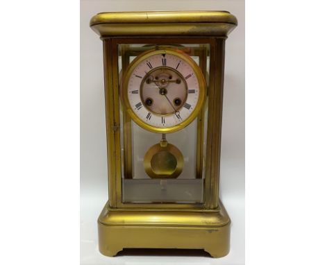 A two train, four glass clock, the four inch white enamel recess dial with roman numerals and visible escapement, the movemen