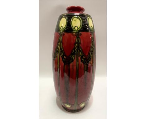 Mintons Ltd secessionist design vase no. 1, tube lined decoration of stylised flowers and swags upon a red ground, black prin