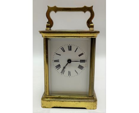 A French brass cased carriage timepiece by Duverdrey &amp; Bloquel, the 2.25in white enamel dial with black Roman Numerals, t