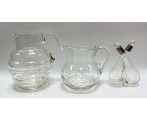 Whitefriars glass jug of ovoid lobed form, height 19.5cm; together with a cut glass jug and a silver mounted glass oil and vi