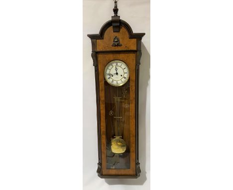 A two-train Vienna wall clock with burr walnut veneered case, the 6in white enamel dial with Roman Numerals and subsidiary se