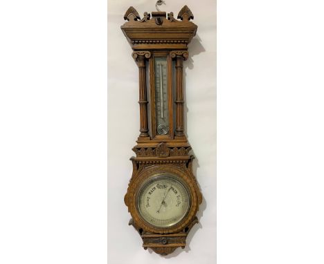 Banjo barometer thermometer within carved oak case, height 98cm