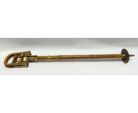 An early 20th century brass mounted bamboo shooting stick, stamped BN S.G.D.G.