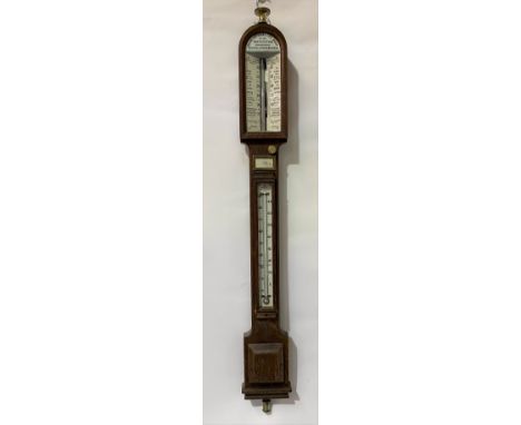 A good oak cased stick barometer thermometer by Negretti &amp; Zambra scientific instrument makers Holborn Viaduct, E.C.122, 