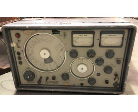 A 1940s Marconi A.M. signal generator type TF 801B/1, serial no. D53592/09, width 58cm, with manual.&nbsp;