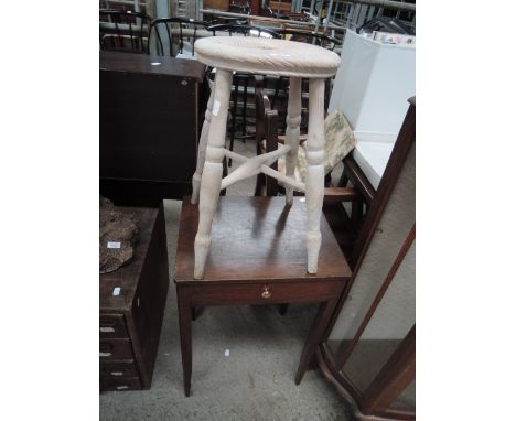 A vintage stripped stool and a mid 20th century stained frame drawer table