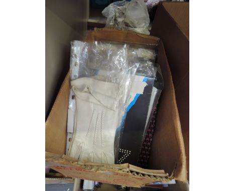 A box of Vintage ladies gloves, tights and stockings