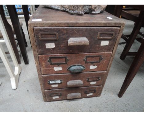 A vintage oak filing drawer