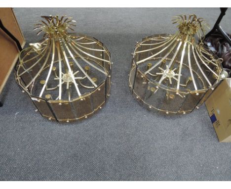 A pair of eight bulb light fittings
