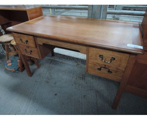 A mid 20th century oak desk