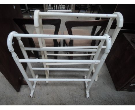 Two white painted vintage towel rails