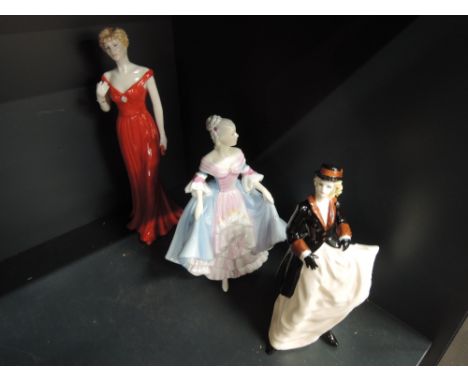 A modern Royal Doulton figurine, Southern Belle and two Royal Worcester figurines, Zara and Lady Diana