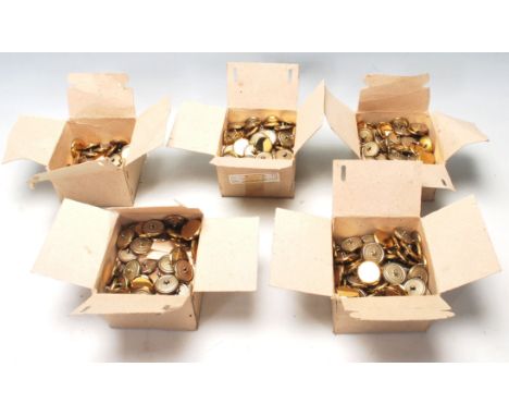A large collection of retro vintage mid 20th century gold plastic shank buttons of flat circular form. Taken from a large pri
