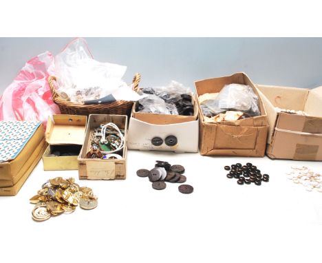 A large collection of retro vintage mid 20th century buttons to include a group of fabric two hole shirt buttons still being 