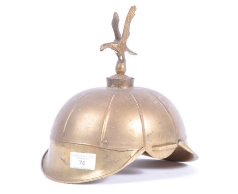 Fancy dress - A replica Imperial German Army helmet of metal construction, having an eagle finial to top, in the style of a&n