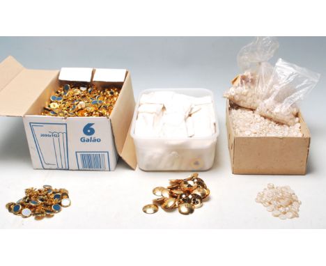 A collection of retro vintage mid 20th century buttons to include a group of gold metal shank buttons having blue plastic at 