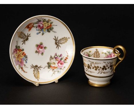NANTGARW PORCELAIN COFFEE CUP & SAUCER painted with sprays of summer flowers between gilt anthemion's, gilt kidney-shaped han