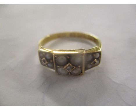 A 15ct gold seed pearl and ruby inset ring, 2.6g 