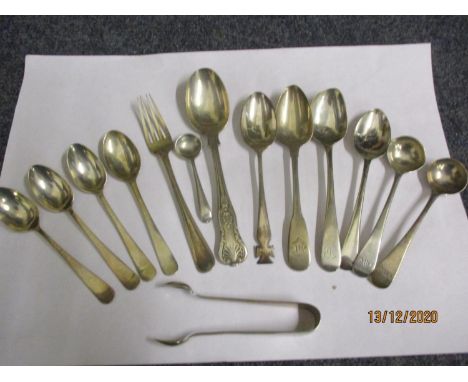 A group of silver flatware to include monogrammed teaspoons and sugar tongs, total weight 175.6g 