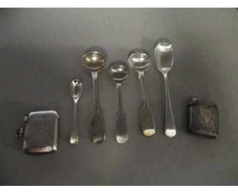 Two silver vesta cases, and a group of Georgian and later silver mustard and salt spoons 