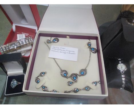A sterling silver turquoise set necklace together with a silver topaz set ring and two ladies wristwatches 