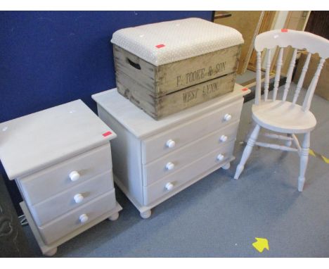 A modern pine chest of three long drawers, a matching bedside chest and a kitchen chair, all painted in a French grey chalk p