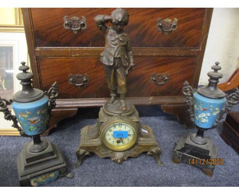 A French mantle clock with spelter figure of a young scholar above together with a pair of cloisonné clock garnitures 