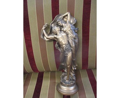A composition figural group painted in a bronze coloured finish with imprints ROM 
