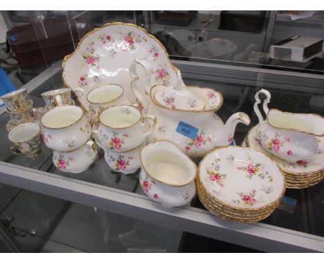 A Royal Albert Tenderness six setting tea service together with five Czechoslovakian coffee cans and six saucers 