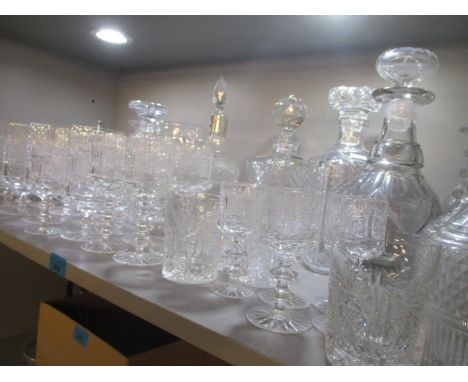 A selection of cut glassware including ring turned decanters and others 